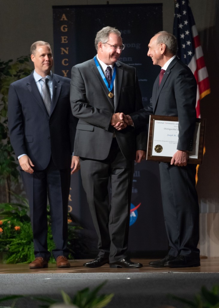 Dr. Joseph Zawodny (center) receives the Distinguished Service Medal from NASA’s Administrator Jim Bridenstine (left) and Associate Administrator Steve Jurczyk (right).